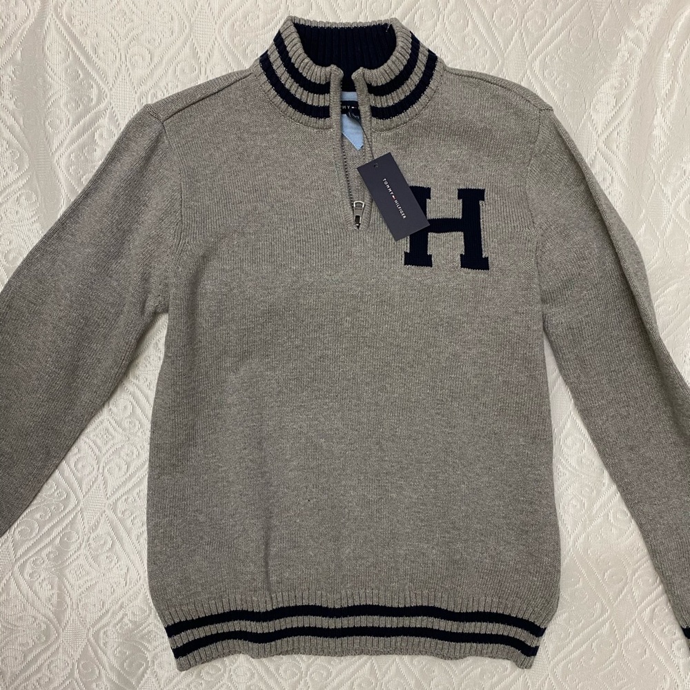 100% Cotton. Long sleeves.